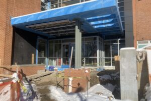 2024 1 17 South Entrance with brick and concrete exterior foundation work